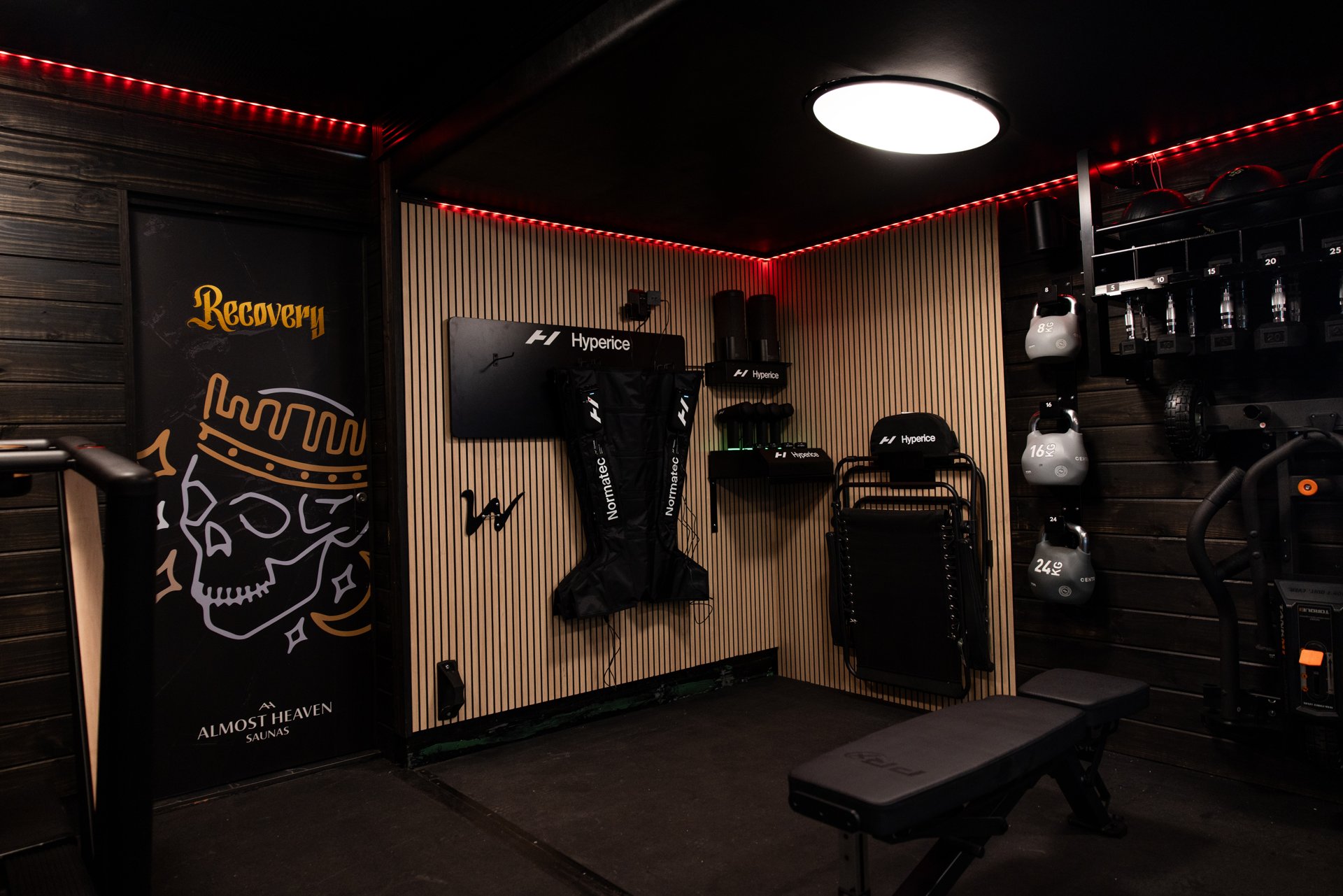Custom gym trailer with branded interior wall and training equipment