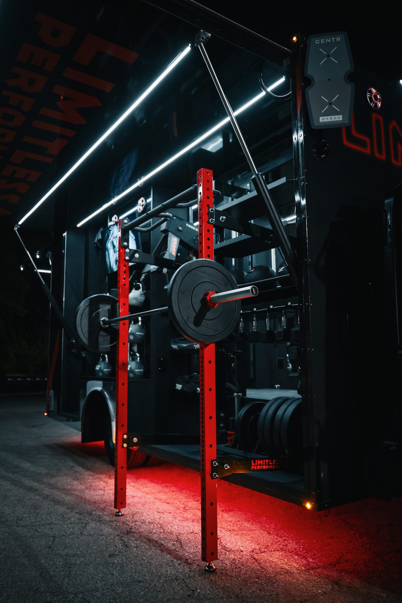 Fit Truk 2.0 exterior rig and squat racks at night