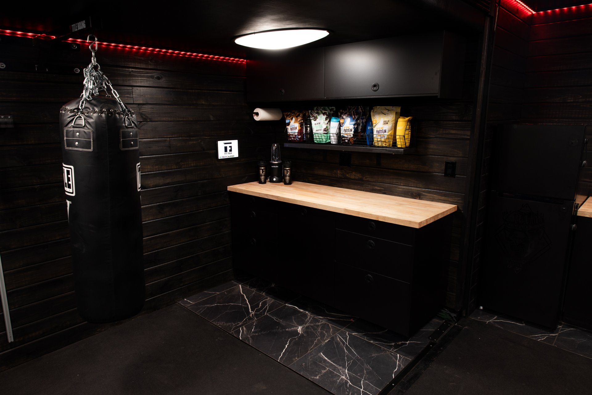 Gym trailer countertop and wall-mounted storage details